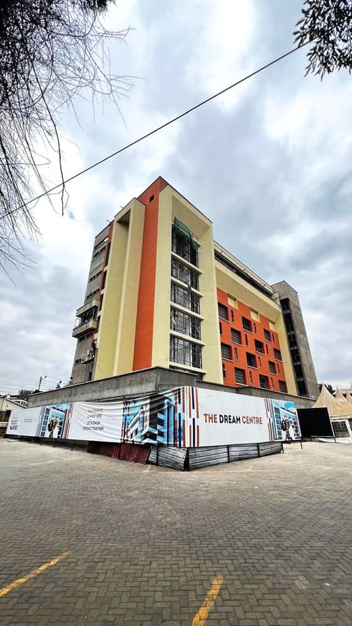 Dream Centre exterior with finish strong banner