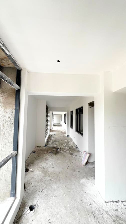 Painted interior corridor with window frames
